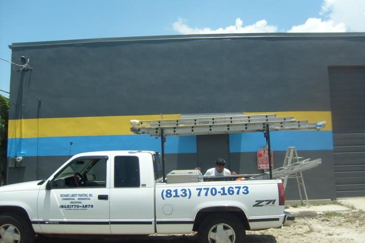 Commercial Exterior Painting with decorative stripe of Auto Garage in downtown Tampa, FL